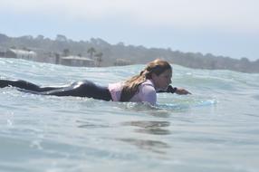 Surfing Paddling Surfer Girl