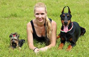 Smiling girl with her pets