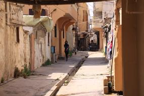 woman on the old street in the city