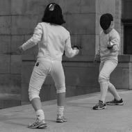 couple are doing Fencing Sports