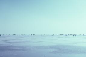 people on the frozen lake