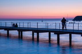 romantic couples on the pier