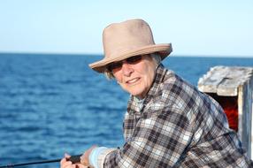 woman fishing on a sunny day