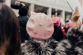 pink beret on a woman's head