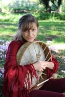 woman holding a drum