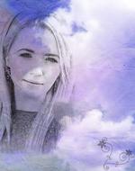 portrait of a girl on a background of cloudy sky