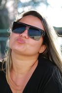 adult Woman in dark glasses