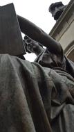 woman reads book, sculpture, detail