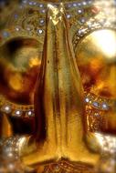 hands of golden buddha close up