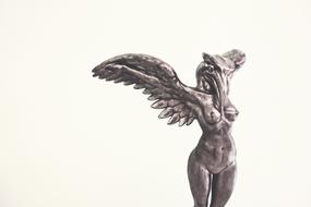 sexy winged female figurine