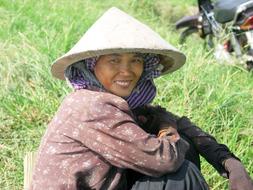 Woman on the grass in Vietnam
