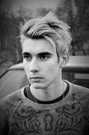 black and white portrait of young stylish blond guy