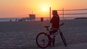 cyclist watching sunset