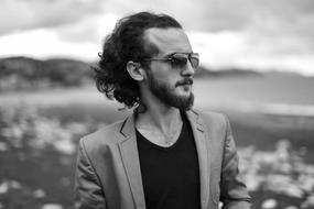 black and white picture of a man in sunglasses