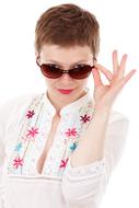 woman posing in sunglasses