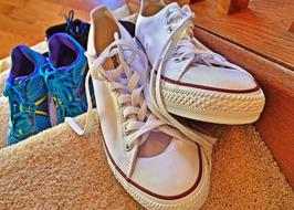 sneakers and sneakers on the stairs close-up