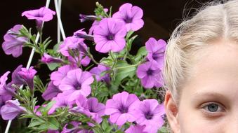 Young Woman Face and purple flowers