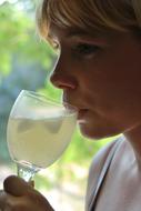 portrait of goodly Woman Drinking Juice