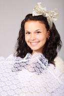 smiling girl with lace umbrella