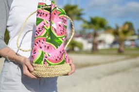 stylish summer bag in female hands