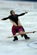 Beautiful figure skating dance of the couple, on the ice