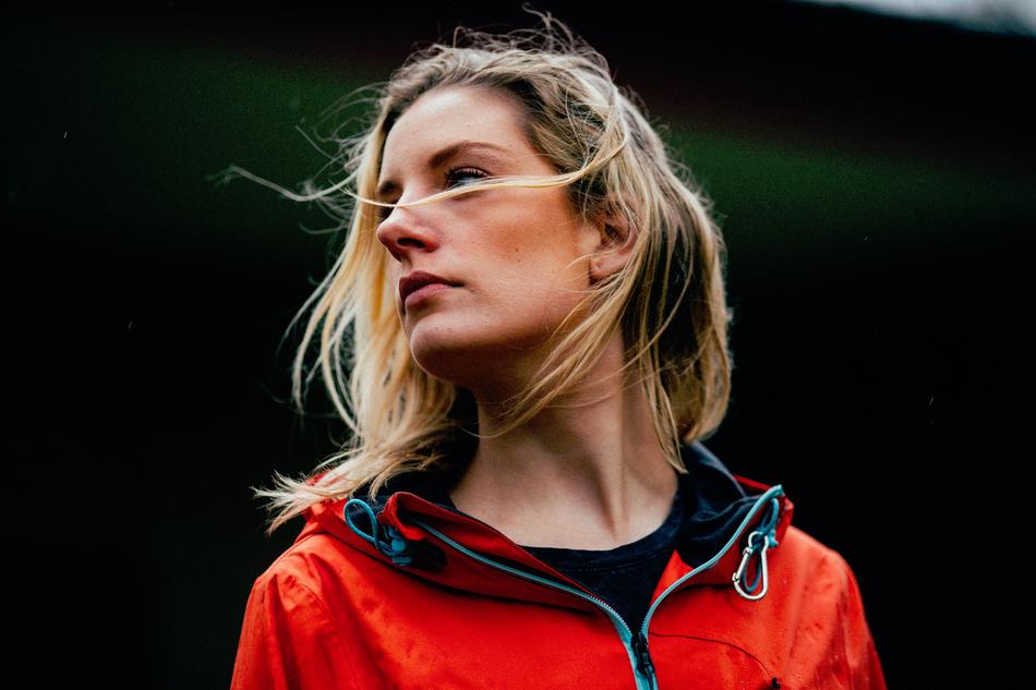 blonde in a red sports jacket
