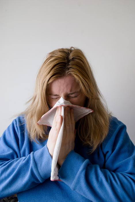 Woman Blowing nose
