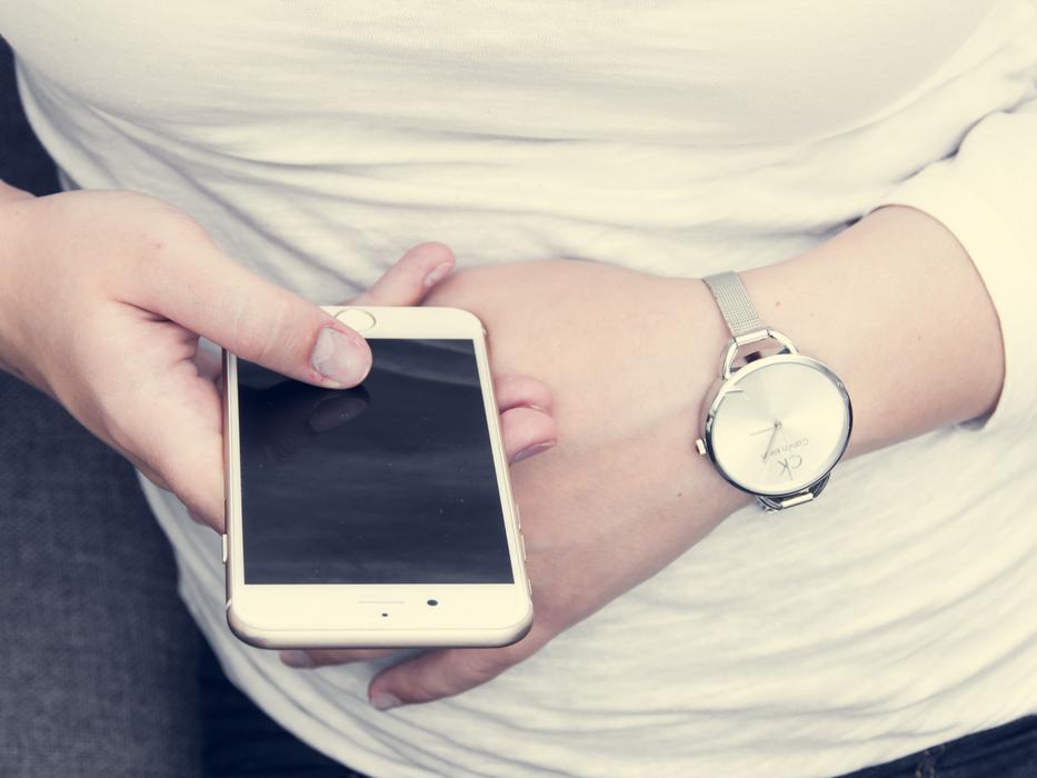 Iphone 6S Plus phone in hands