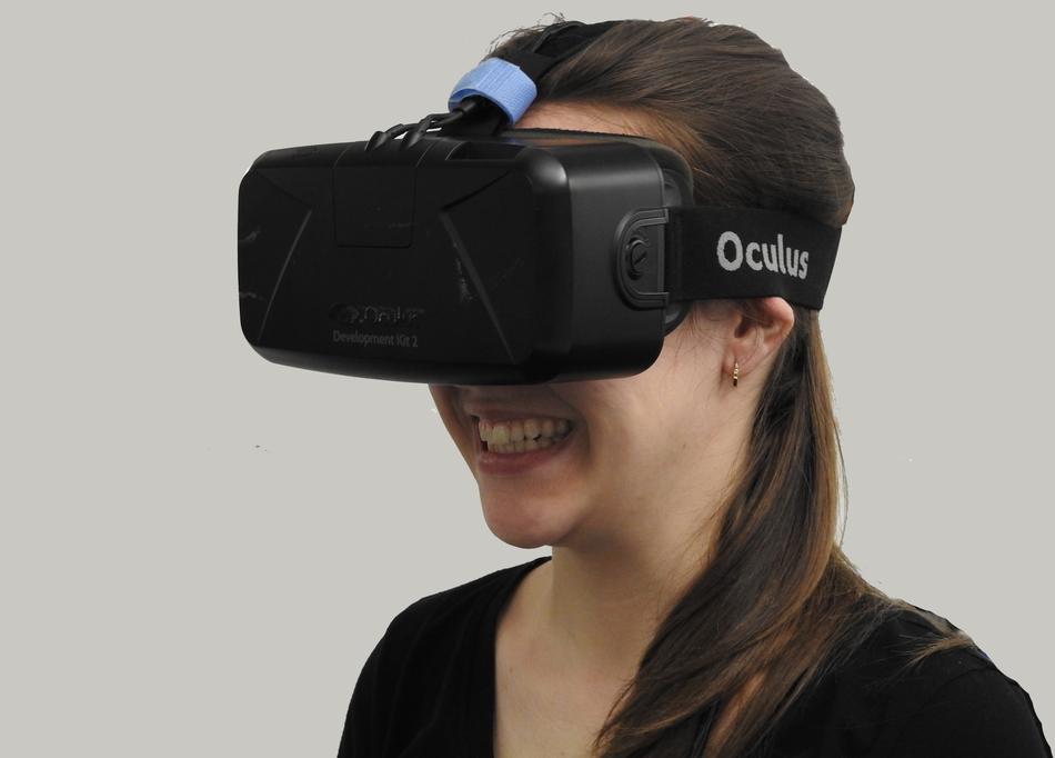 young smiling Woman in Vr googles