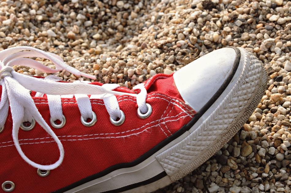 Red sneaker on the ground
