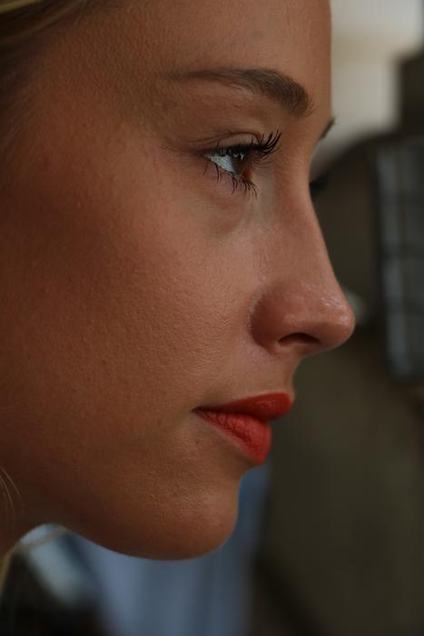 Profile picture of a girl with red lips