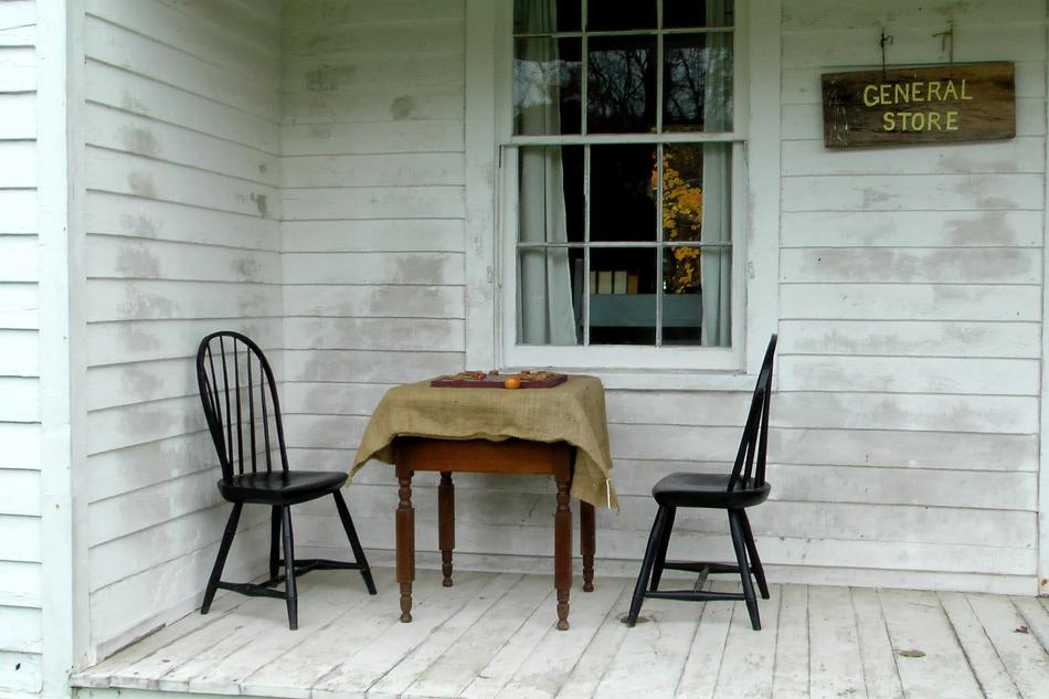 furniture on the porch of the general store