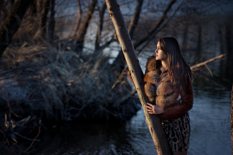 Beautiful girl in front of the river