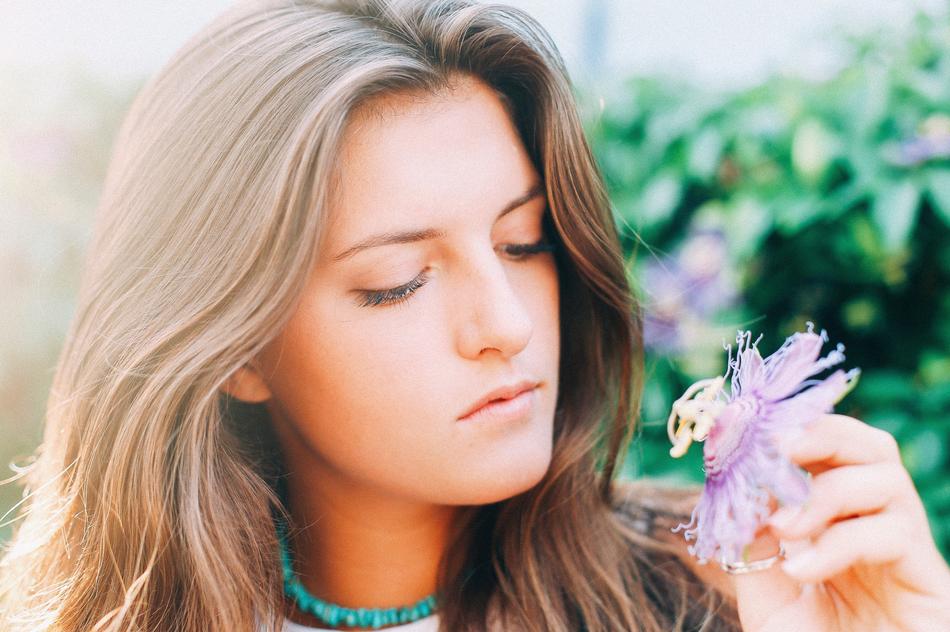 pretty Girl with Flower in hand
