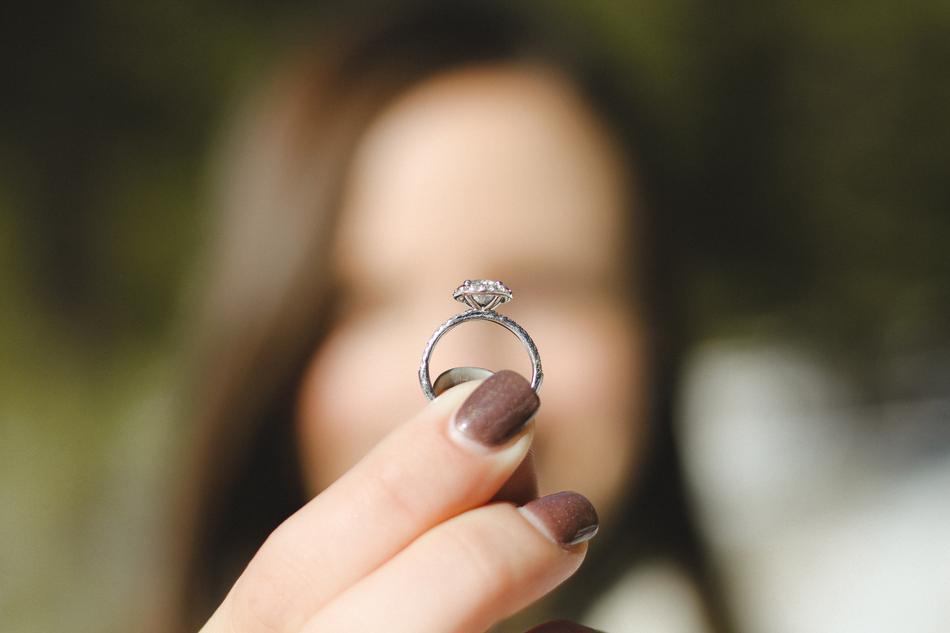 Silver ring in a woman hand