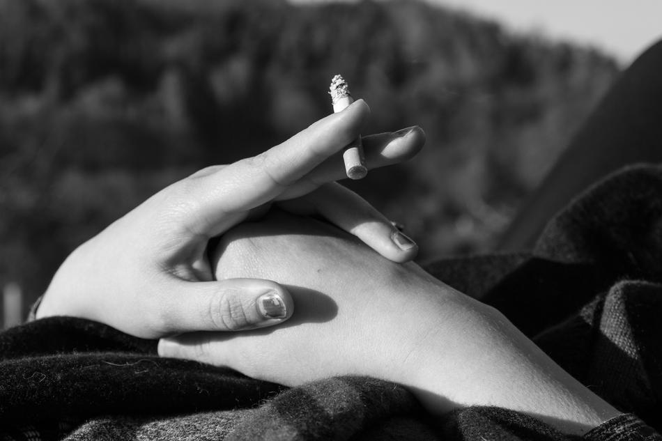 Hand Smoking Woman