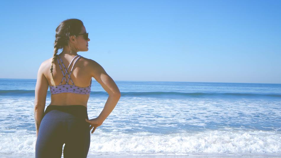 young sportive Woman on Beach