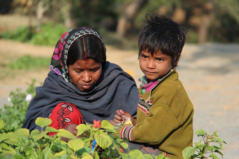 Woman with child in Delhi, India