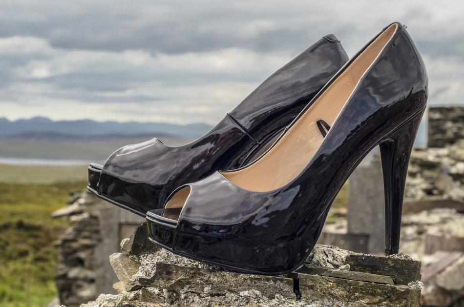 fashionable stylish shoes on the top of the mountain close up