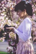 girl and flowering tree