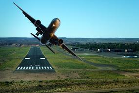 airplane is flying from Airport