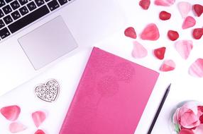 Pink Notebook on Table