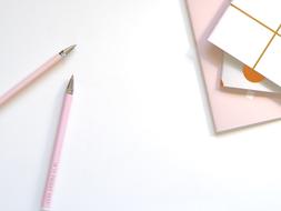 pink Pencil and pink Paper