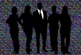 team of businessmen on a background of binary code