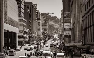black and white photo of a busy city in South Africa