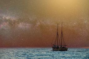 painted ship on a background of the starry sky