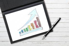 business growth, pen at colorful diagram
