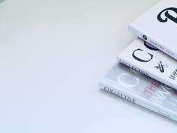 stack of magazines on white background