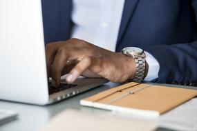 Businessman works with Laptop