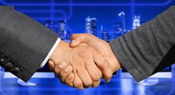 handshake against the backdrop of a metropolis